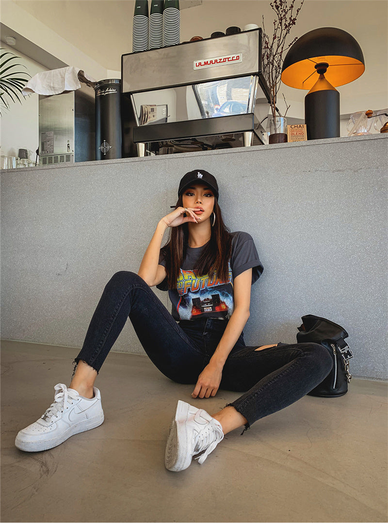 Raw-edge ripped high-waisted jeans